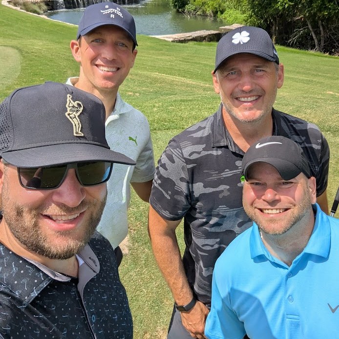 Tom Sylvester golfing with friends