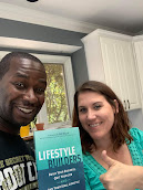 A couple holding a copy of Lifestyle Builders