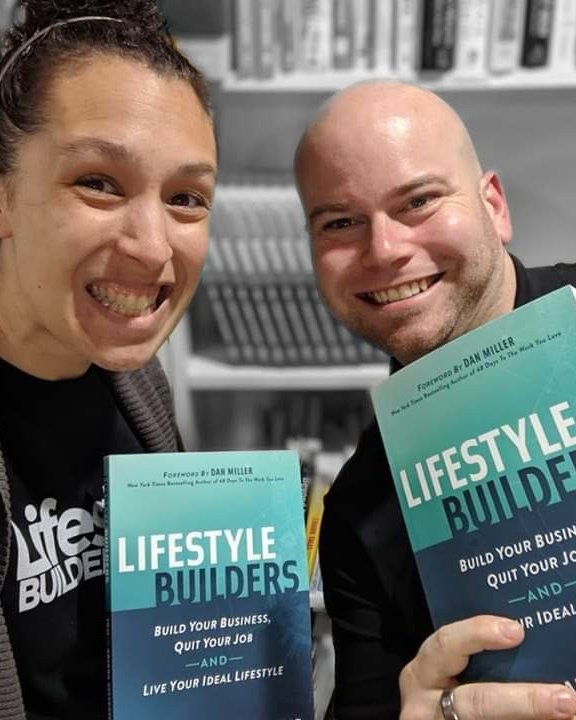 Tom and Ariana Sylvester holding copies of Lifestyle Builders