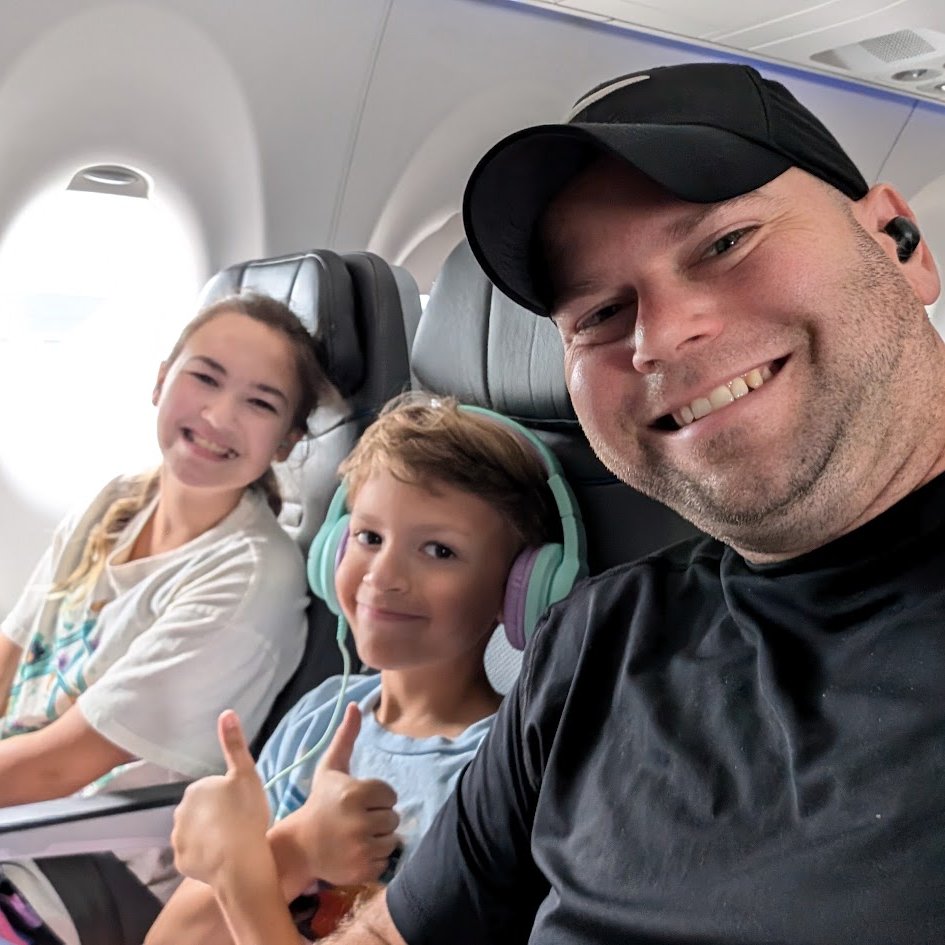 Tom Sylvester traveling with his children